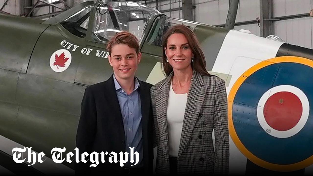 Prince George joins mother on visit to RAF base